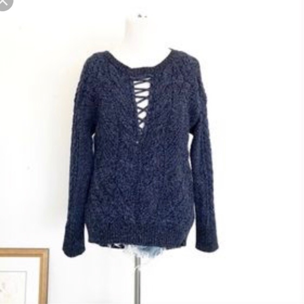 Blue sweater with cross cross detail